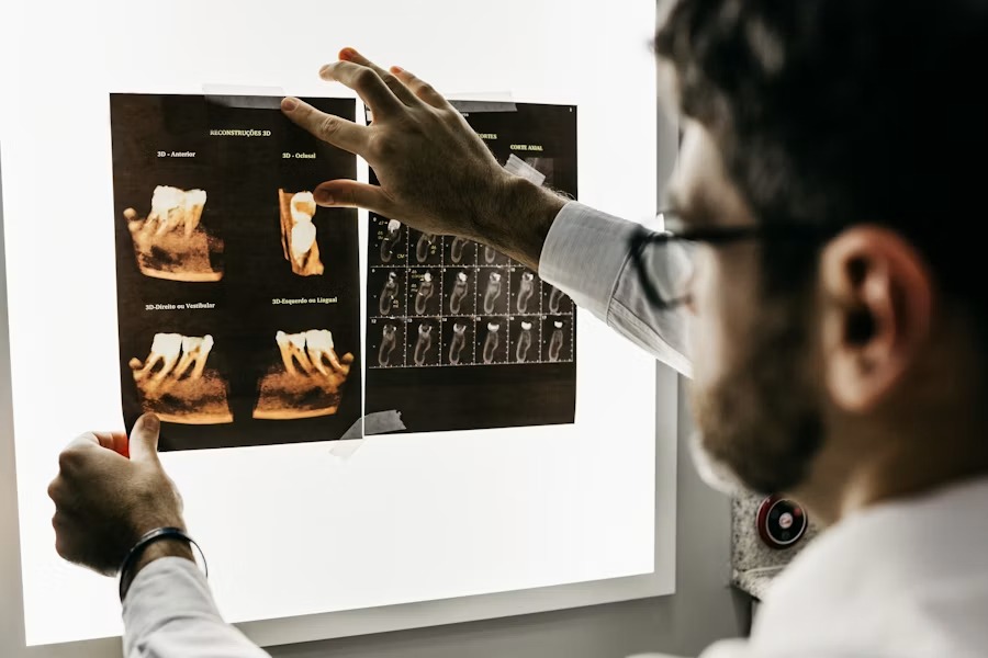 Dentist analyzing 3D dental diagnostics